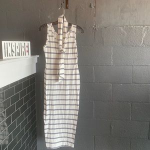 White dress with blue stripes. Comes many sizes
